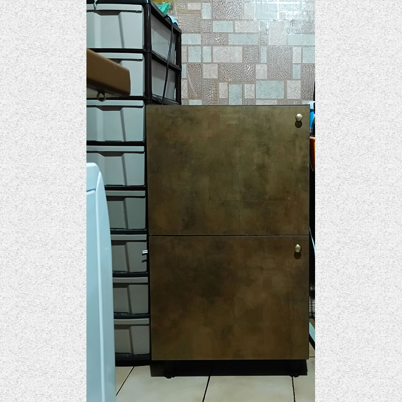 picture of a kitchen. We see cabinet